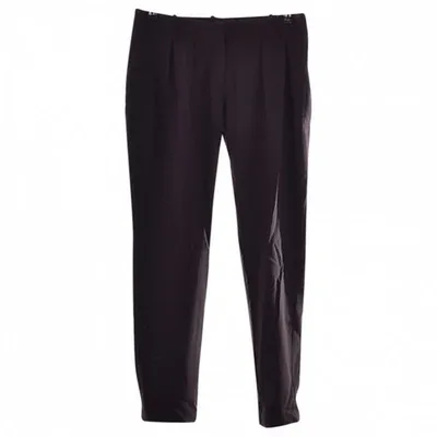 Pre-owned Maje Trousers In Black