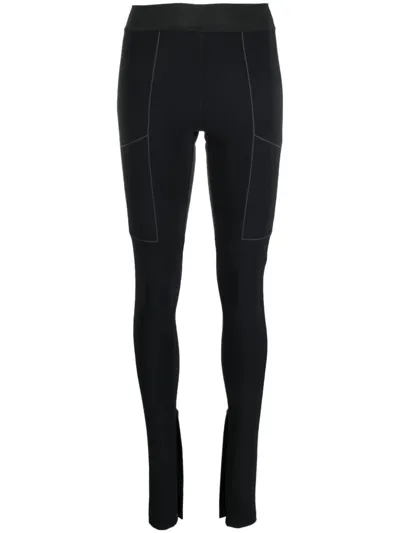 Coperni Stretch-design Slit Leggings In Black