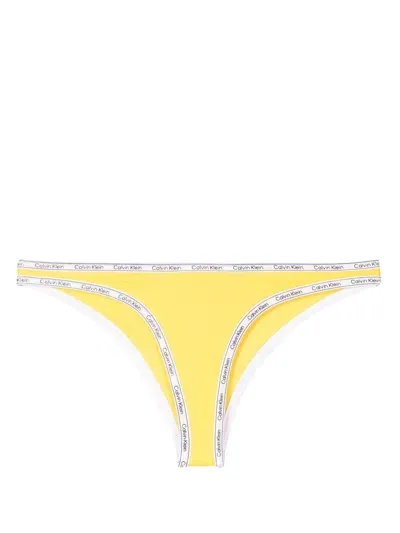 Calvin Klein Logo-print Strap Bikini Bottoms In Yellow