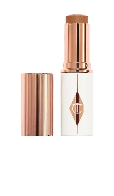 Charlotte Tilbury Unreal Skin Sheer Glow Tint Hydrating Foundation Stick In 12.5 Tan