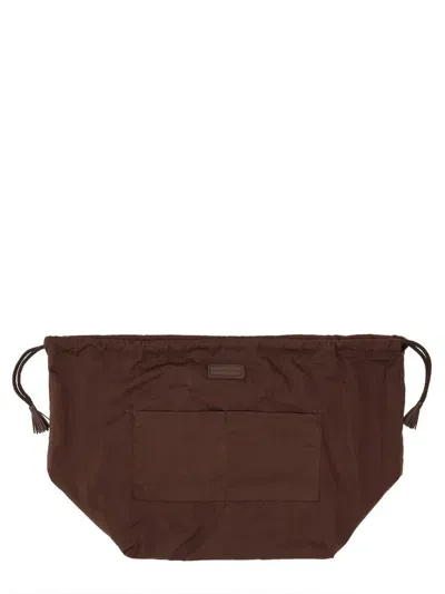 Dragon Diffusion Logo Patch Drawstring Clutch Bag In Brown