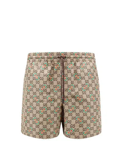 Gucci Monogrammed Drawstring Swim Trunks In Cream