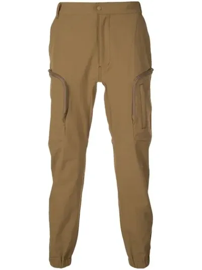 White Mountaineering Tapered-leg Cargo Trousers In Brown